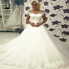 Gorgeous ball gown lace up back appliques Cap sleeve princess wedding dresses V neckline puffy bridal gowns best selling Gorgeous ball gown lace up back appliques Cap sleeve princess wedding dresses V neckline puffy bridal gowns best selling