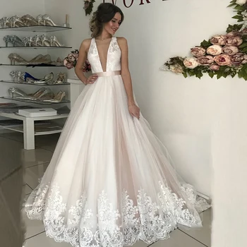 

Plunging Illusion Tulle Neck Lace Wedding Dress with A Belt Criss Cross Court Train Applique Edge Wedding Ball Gown Bridal Dress