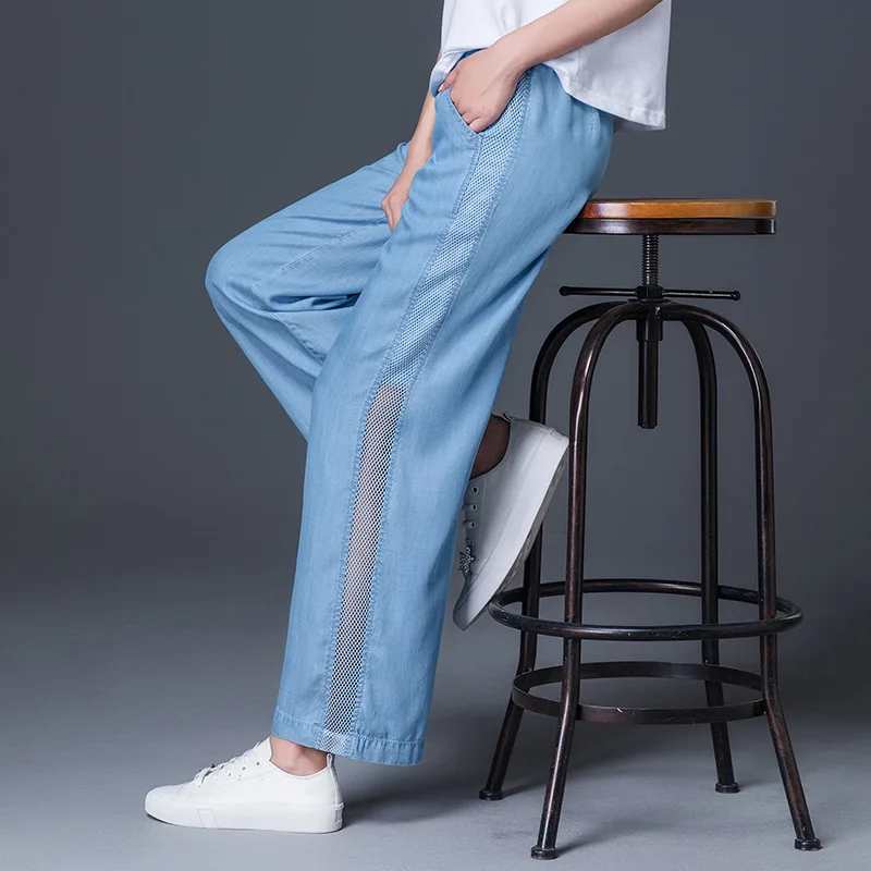 

Women's Tencel Jeans Middle Waist Large Size Loose Side Nets Hollow Fashion Sky Blue Thin Summer Elastic Band Ankle Length 3XL