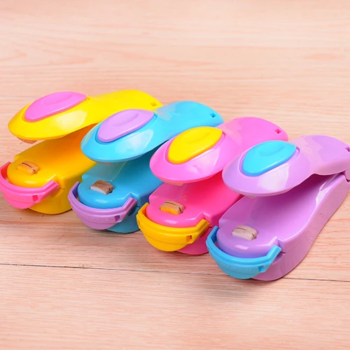 

Random color Portable Travel clip holder Mini Hand Pressure Heating Head Sealing Machine Accessories Clips Dispense Snacks Bag
