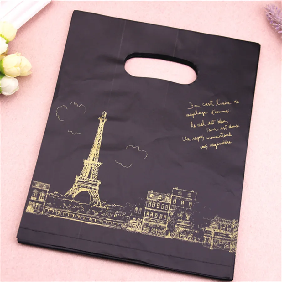 

New Design Wholesale 100pcs/lot 20*25cm Black Luxury Eiffel Tower Gift Packaging Bags for Party Favor Plastic Gift Bags