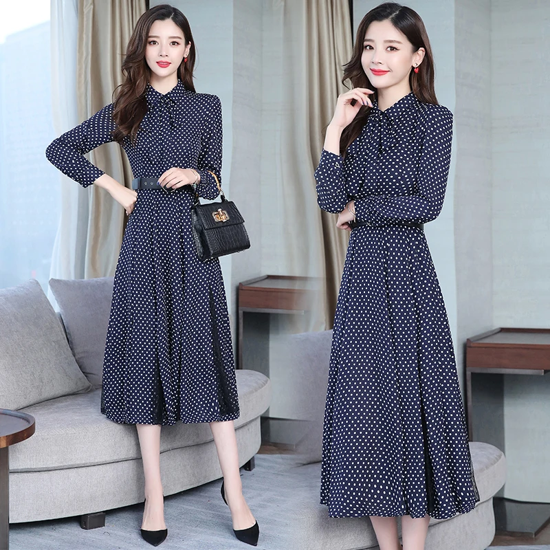

2019 spring and summer new long temperament high waist lace stitching over the knees wild wave dress