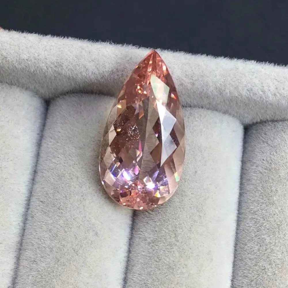 

Pink morganite, beautiful orange pink,Weight: 996CT, specification 21 * 11 * 7.8mm,Perfect gemstone perfect quality