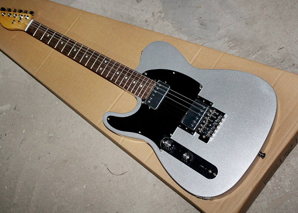 

Silver Left-hand Electric Guitar with Black Pickguard,Rosewood Fretboard,Chrome Hardwares,offering customized services