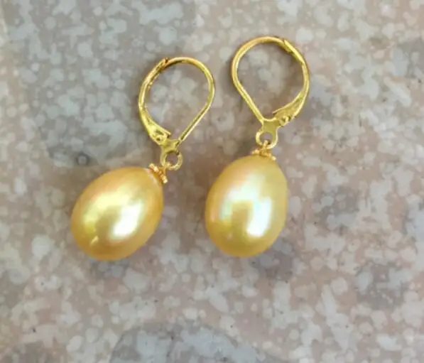 

Pair Of huge 9-11mm south sea baroque gold pearl earring 14k