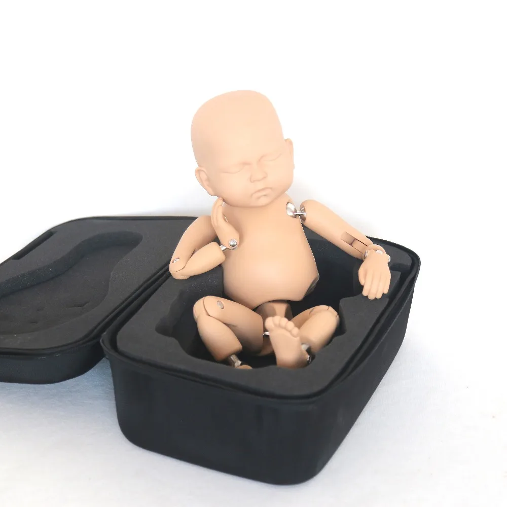 newborn training doll