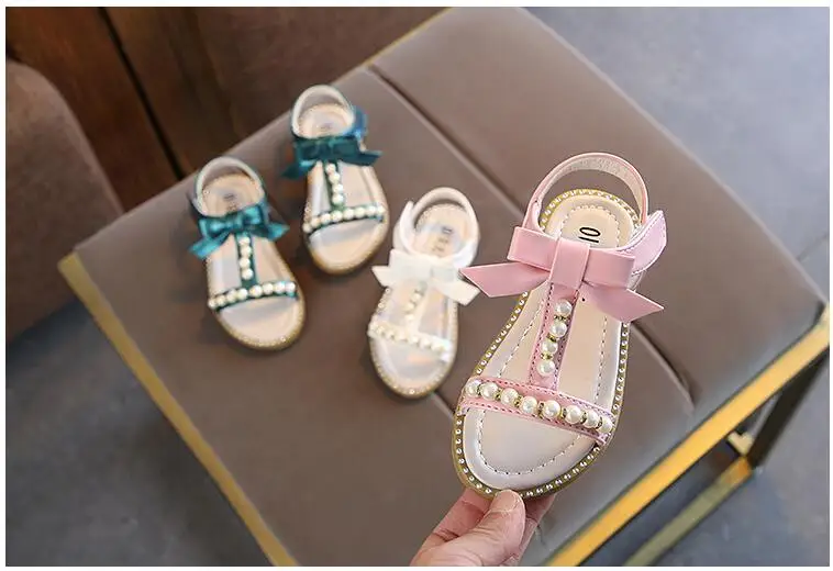 Новые летние детские сандалии девушки принцесса красивый бриллиант обувь с бантом дети плоские сандалии для маленьких девочек римские туфли