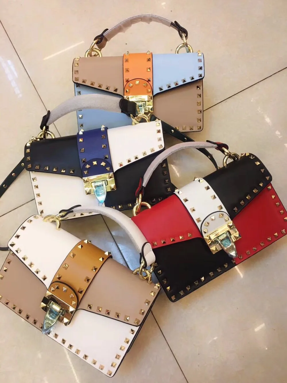 

free shipping the new spring and summer in Europe and the head layer cowhide leather handbag fashion rivet BaoXiaoFang single sh