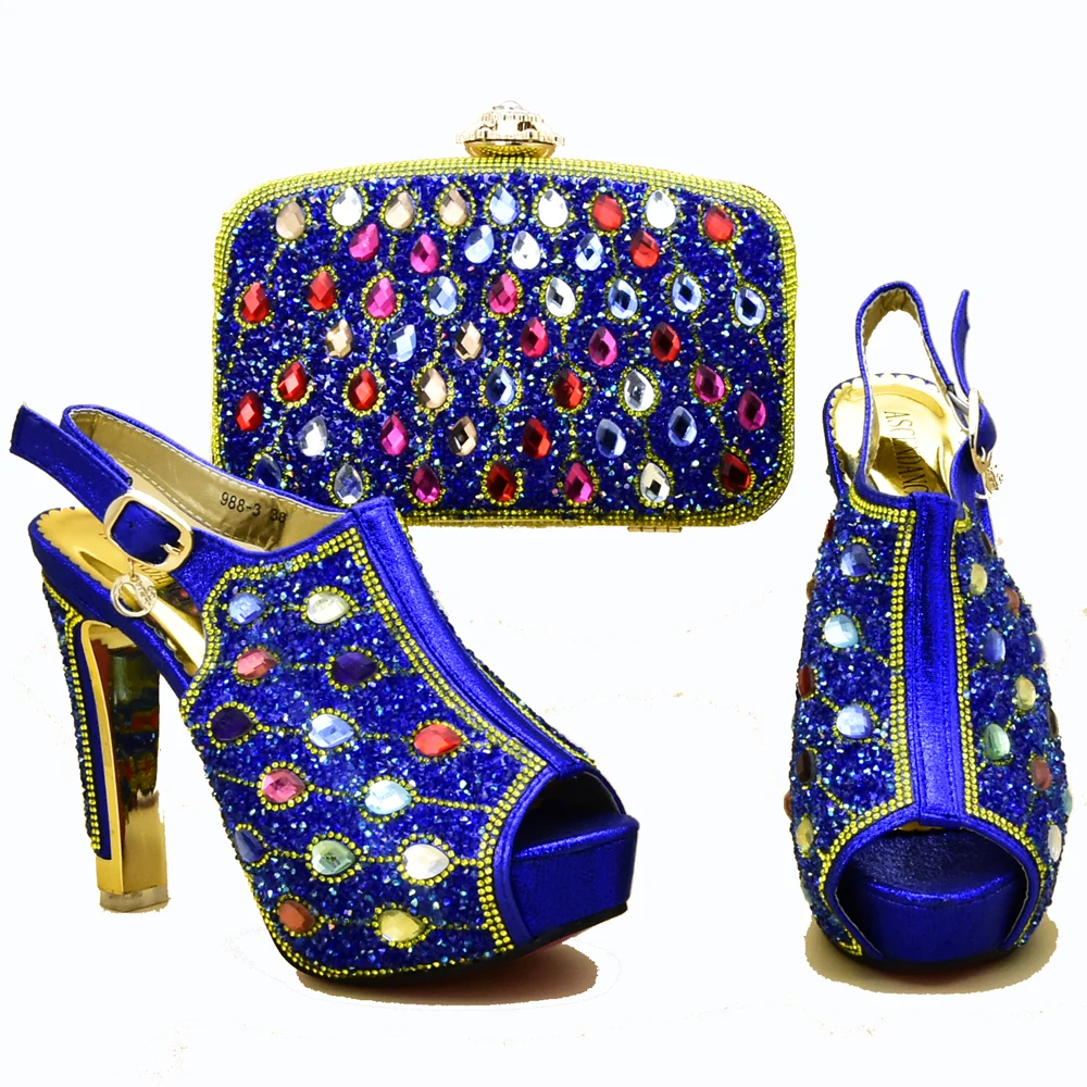 Royal blue italian shoe and bag set with colorful stones shinning ...