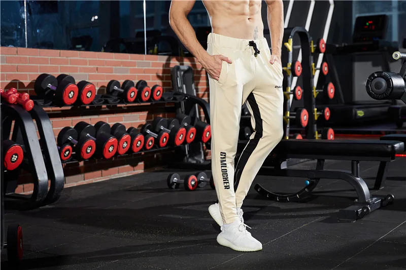 HETUAF мужские новые модные штаны 2018 повседневные штаны для пробежек мужские спортивные штаны мужские Прошитые штаны на молнии M-XXL