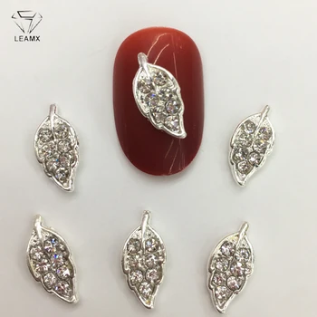 

LEAMX 10 PCS/bag Rhinestone Leaves Nails Art Decorations Shining 3D Leaf Silver Metal Nail Jewelry Studs DIY Manicure Gem L436