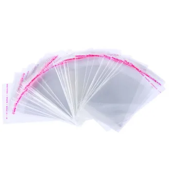 

LASPERAL 200Pcs Space Plastics Packing Bags Clear Self Adhesive Seal Plastic Bags For Christmas Patry Transparent Pouches