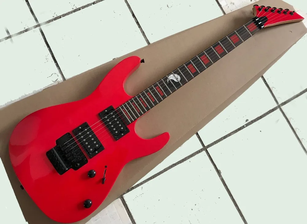 

Factory new arrival red electric guitar with tremolo,Rosewood fretboard wit red inlays,Humbucker pickups,can be customized