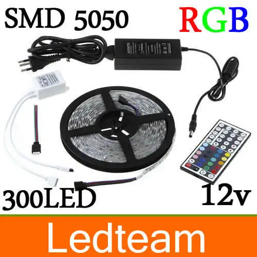 

New Popular RGB Led Strip 5M SMD 5050 300 LEDs/Roll waterproof IP65 + 44 keys IR Remote Controller + 12V 5A Power Adapter