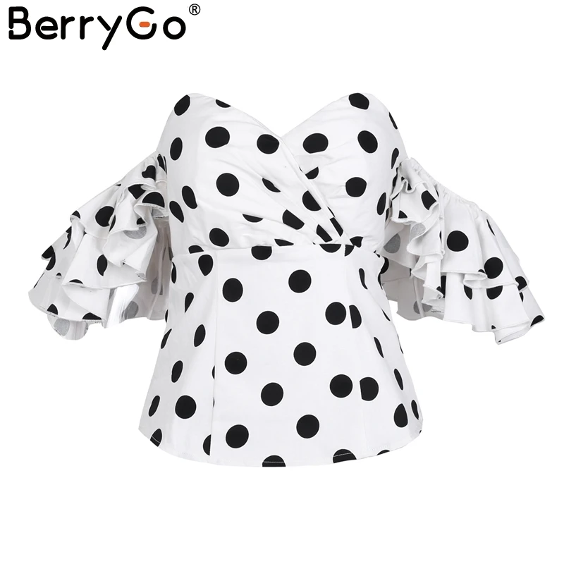 Женская блузка в горошек BerryGo черная с открытыми плечами и рюшами рукавом