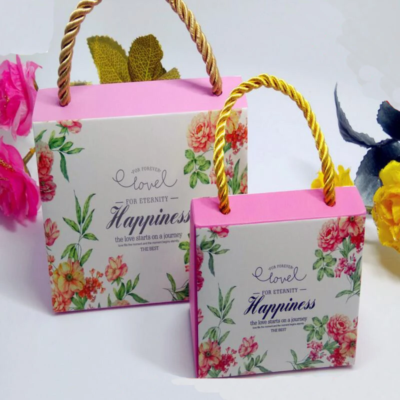 

20pcs/lot Wedding Gift Chocolate Hand Box Flower Color Printed Candy Box Handbag Gift Box for Wedding Party Favors