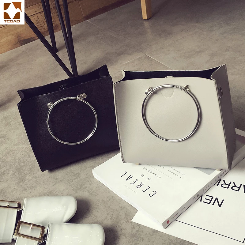 

Fashionable new style women messenger bag metal circular handle single shoulder bag women leather high quality hot selling style