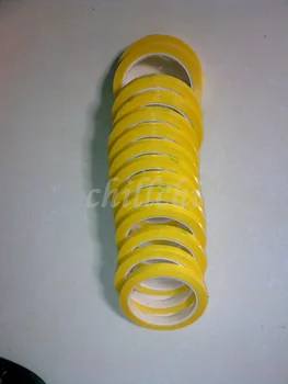 

Transformers with pressure sensitive tape yellow tape 50 m roll width 19mm Mara tape