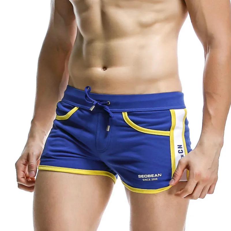Новые модные хлопковые повседневные мужские популярные дышащие абсорбирующие домашние сексуальные шорты с средней талией для молодых людей разных цветов