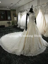 100% Real Picture Wedding Dresses 2016 Hand-Beading Long train Bridal Gowns Appliques Lace Backless Bridal Gown