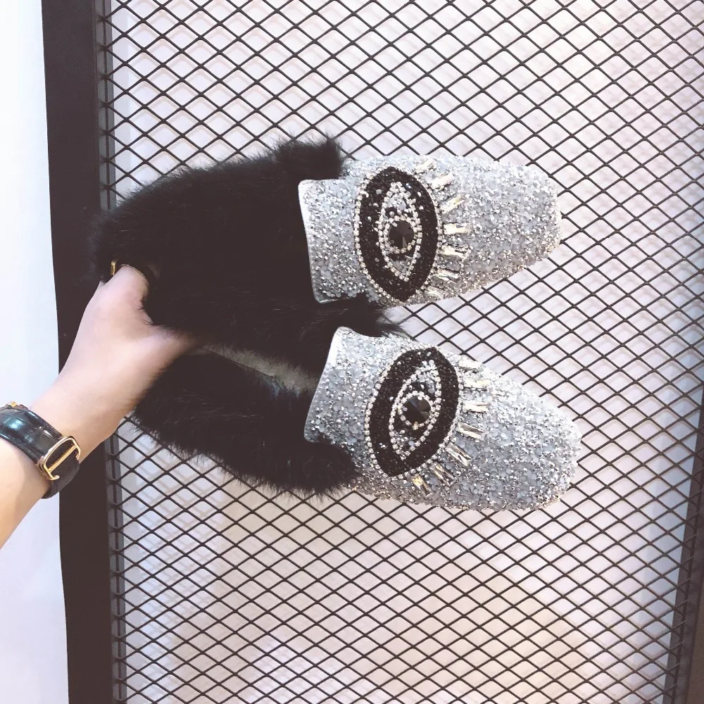 

2018 new fur slippers female flash diamond bright diamond eyes wear fashion lazy flat shoes.