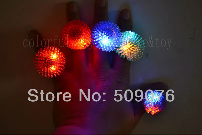 

Free shipping 24pcs/lot led party finger light Flashing Colorful LED Light Up Bumpy Jelly Rubber Rings Finger Toys for Party