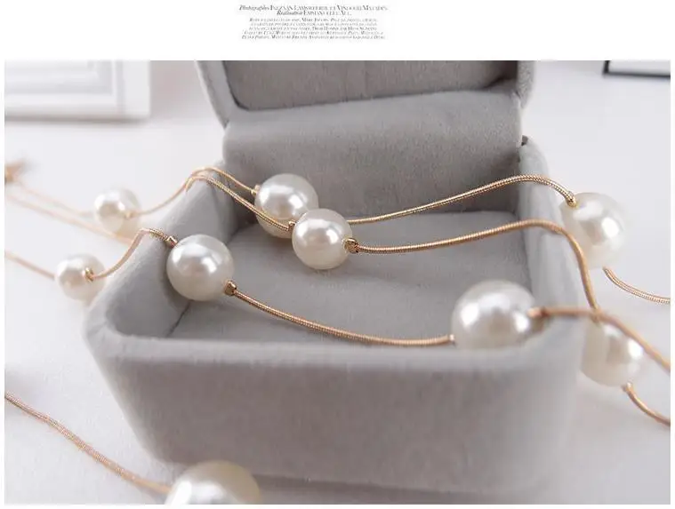 Korean version of the multi-layer fashion double-layer pearl sweater chain long decorative necklace