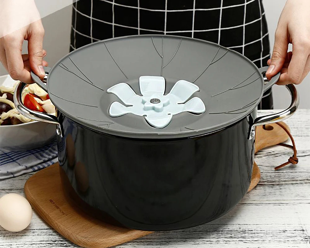 Multi purpose silicone anti overflow lids Rotating lids Steaming grids