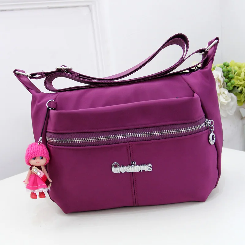 

Preppy style pure color nylon shoulder bag Waterproof solid contracted joker crossbody bag Brand high quality book bag