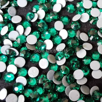 

14 cutting facets of stones size ss16 emerald color with 1440 pcs per pack ;hot fix iron on stone for evening sexy decor