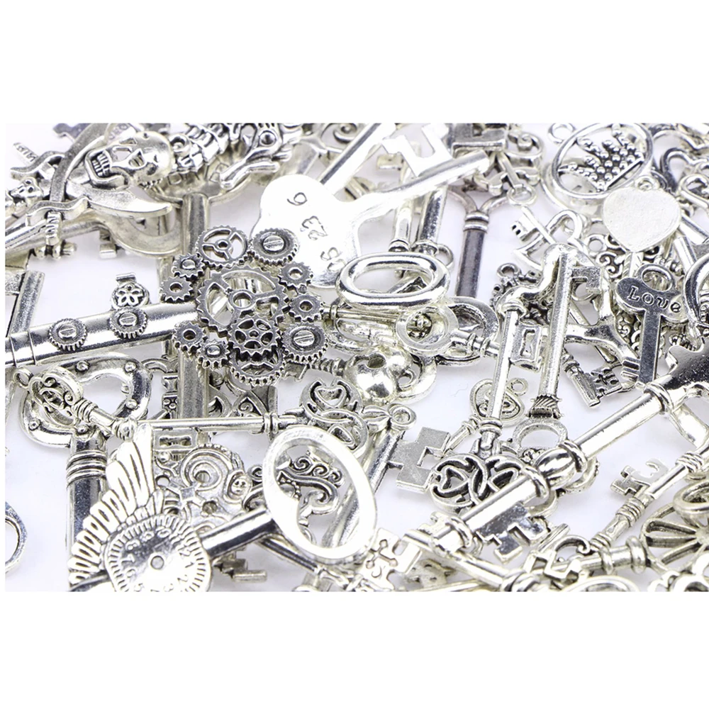 20 шт./упак. тибетские серебряные маленькие-бреллоки для ключей для бижутерии, материал для рукоделия с разными рисунками в форме ключа кулон Ювелирное Украшение ручной работы