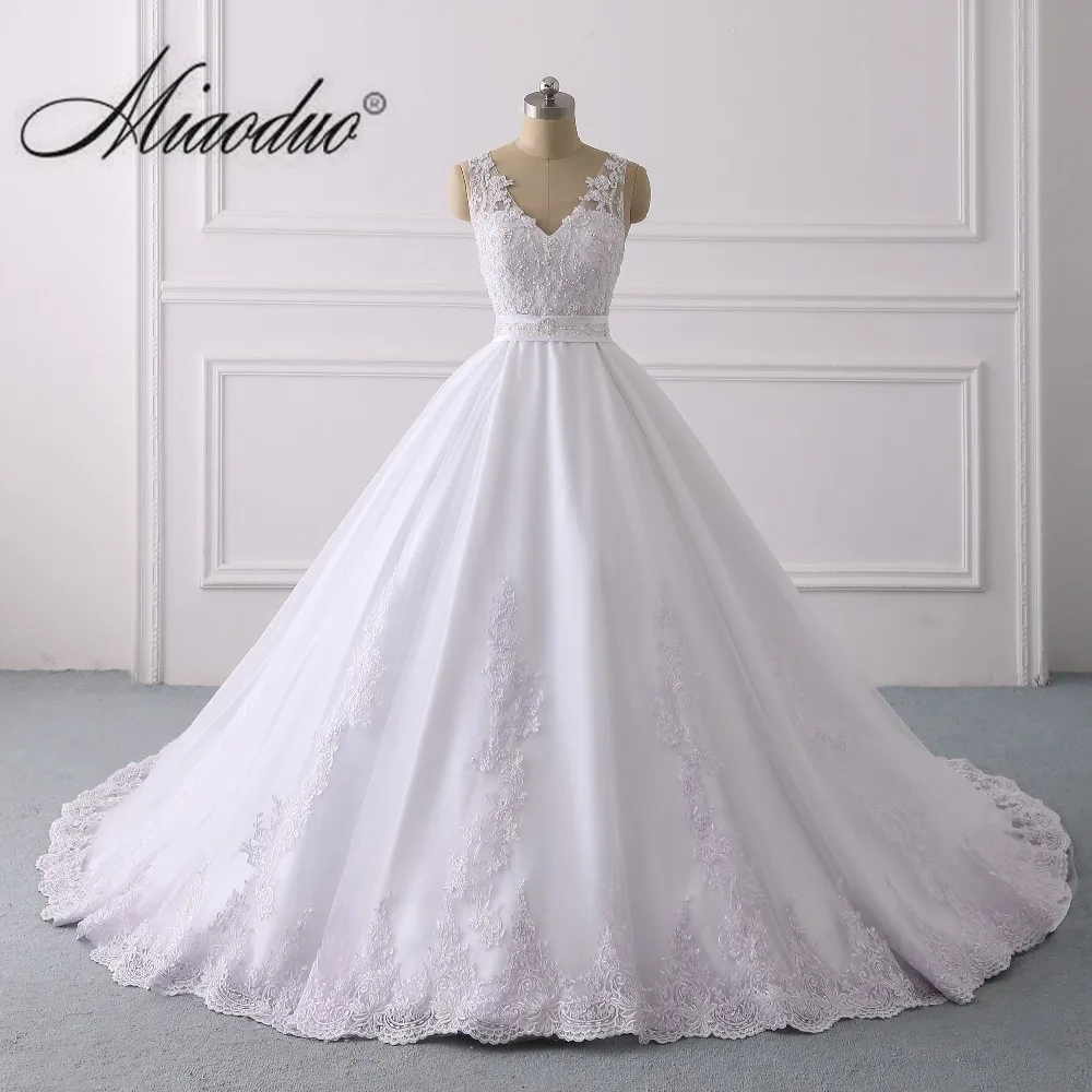 

Miaoduo Design 2019 Sleeveless Wedding Dresses with Beading V Neck Ball Gown Chapel Train bride dress Gowns vestido branco New