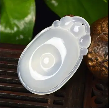 

Natural agate chalcedony in front of jade crafts pendant chalcedony pendant