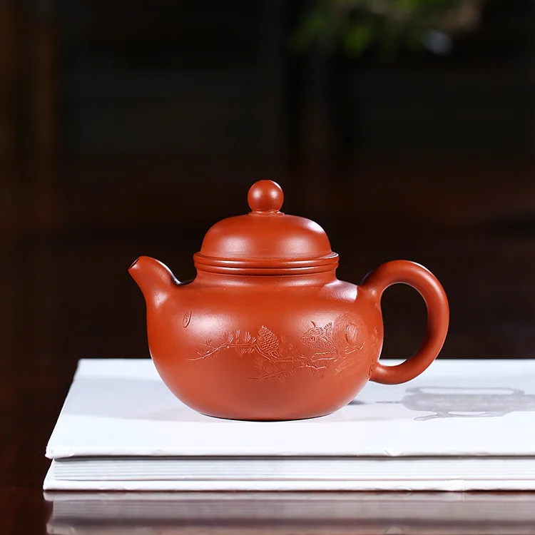 

Yixing Enameled Pottery Teapot Full Manual Raw Ore Cinnabar Squirrel Kick The Ball Famous Fan Zi Hong Kung Fu Tea Have Teapot