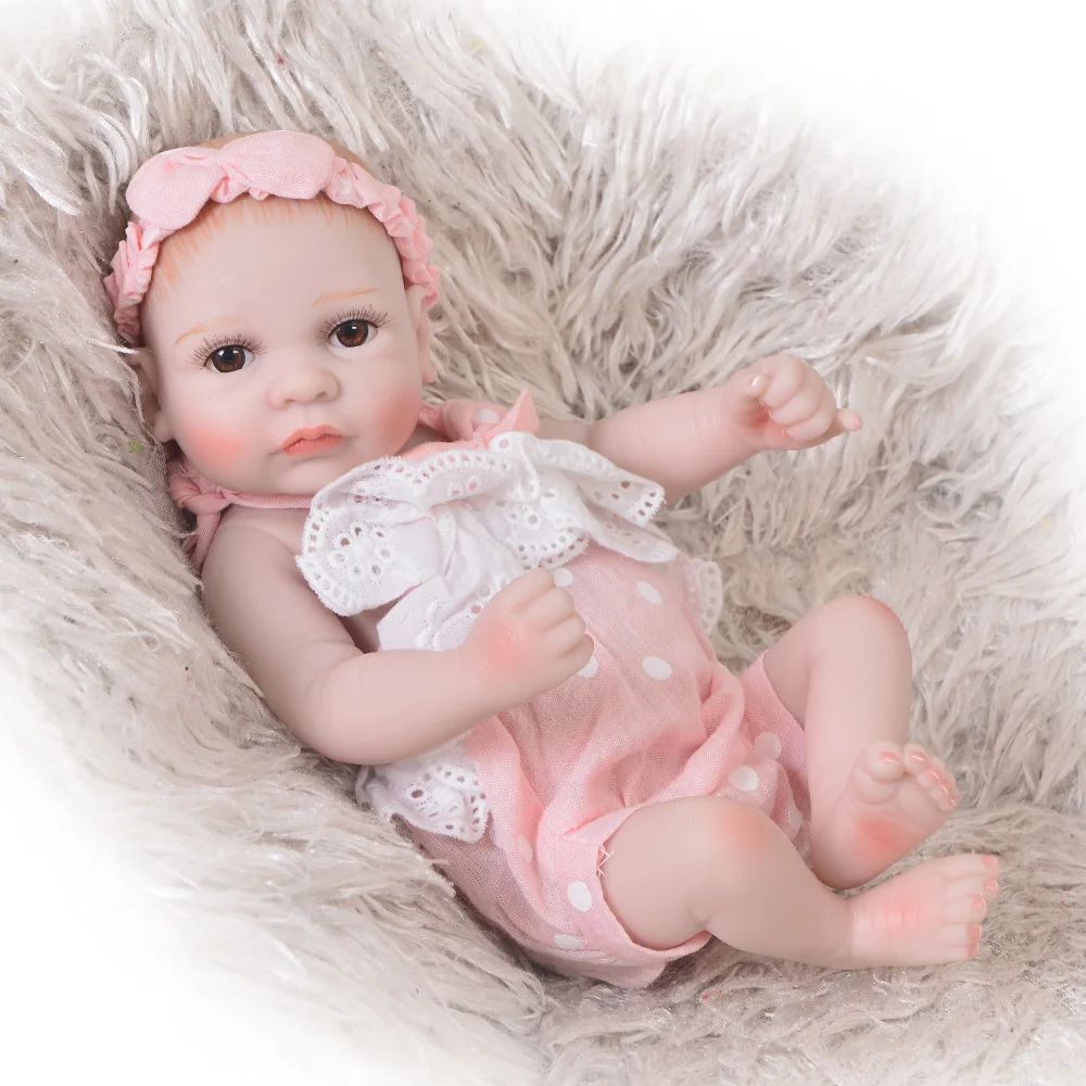

Reborn Doll Full Silicone Body Little Bebe Doll Painted Hair Girl Princess Toy For Kid Christmas Gifts and Birthday Gifts