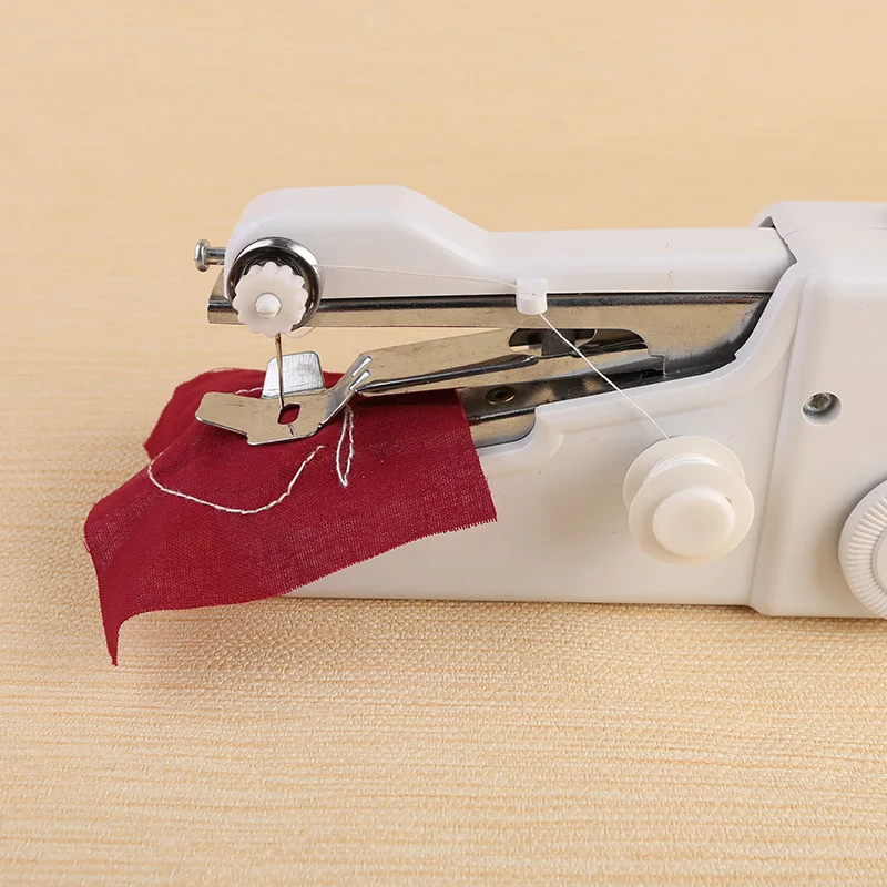 Portable Mini Handheld Sewing Machines Handy Stitch Clothes Fabrics Sew Needlework Cordless Electric household Sewing Machine  (2)