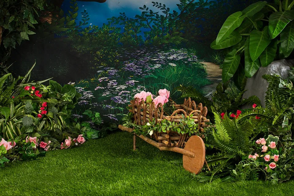 Fairy Wheelbarrow Enchanted Forest flower leaves backdrop
