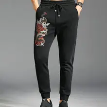 В европейском стиле Мужские штаны личность вышивка с изображением головы льва с хорошей терморегуляцией для ног Штаны мужские повседневные брюки K870