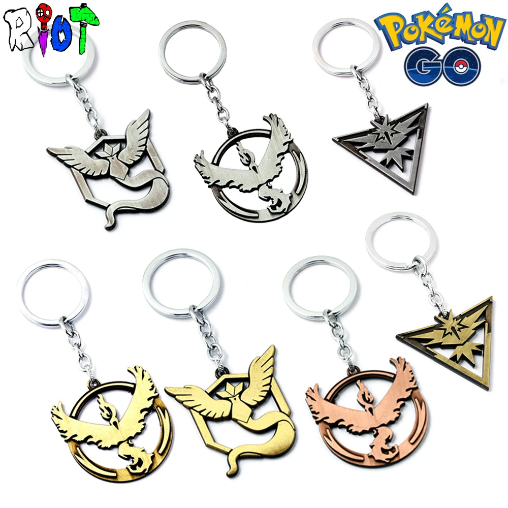 

10 types anime Pokemon Go Keychain Team Valor Instinct Mystic Logo Alloy Keyring bronze ancient silver Unisex Jewelry Collection