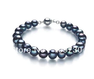 

hot sellHUGE TAHITIAN GENUINE BLACK PERFECT ROUND AAA PEARL BRACELET 7.5
