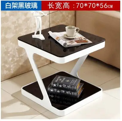 Simple modern tempered glass coffee table. Creative living room small side coffee table. Simple modern tempered glass coffee table. Creative living room small side coffee table.