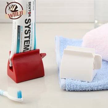 

WIILII 1 Pcs Practical Home Bathroom Set Accessories Rolling Tube Extruder Tooth Paste Dispenser Tooth Brush Holder Random Color