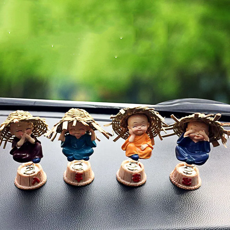 

Car dashboard shaking head toy cute resin straw hat four sets of small monk auto decoration accessories car doll ornaments
