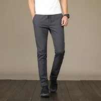 Новые мужские повседневные брюки осень зима Дизайнерские однотонные Большие размеры тонкие Стрейчевые брюки мужские Свободные тренировочные брюки M ~ 5XL AFK01