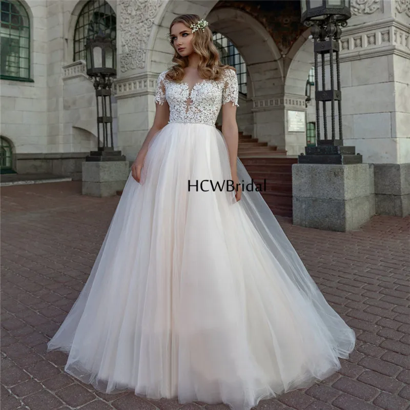 

Short Sleeve Wedding Dresses 2019 Gorgeous Lace A Line Floor Length Illusion Sexy Arabic Bridal Dress Custom Made Robe De Mariee