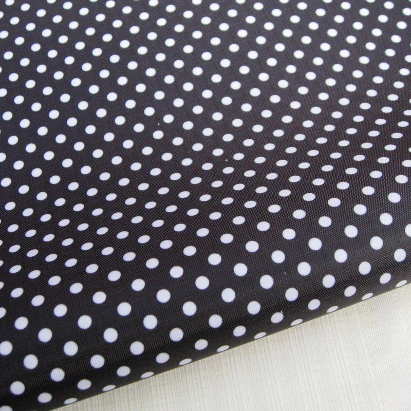 

WF114 - PVC coated waterproof fabric - polka dot on black