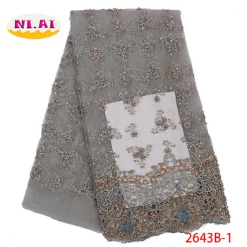 

2019 French Beaded Lace Fabric Latest African Tulle Lace Fabric With Beads Embroidery Lace Fabrics For Wedding Dress XY2643B-2