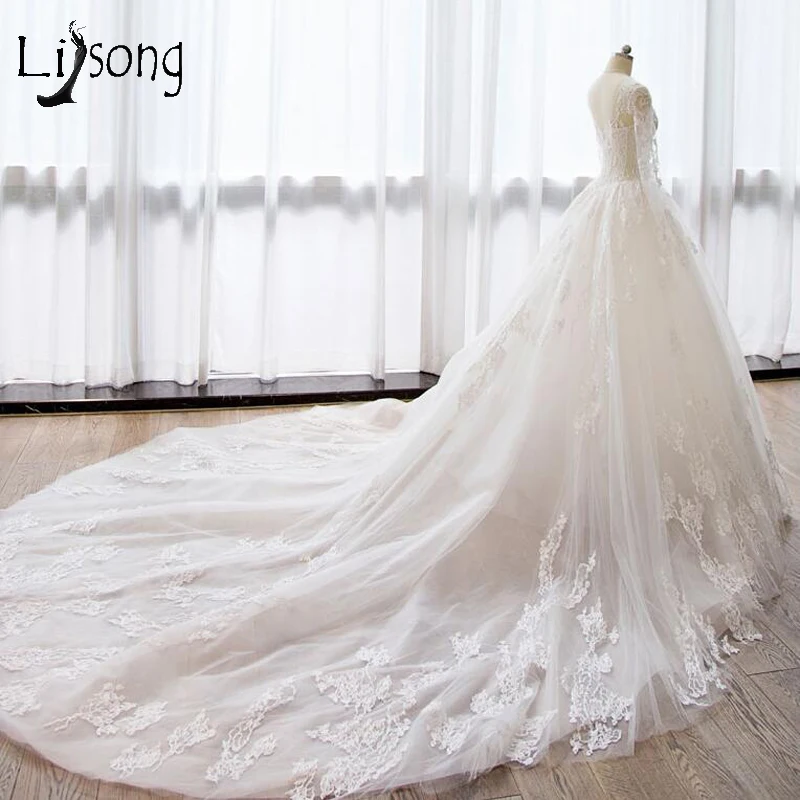 Lace Wedding Dresses 2018 Illusion Full Sleeves Liques A Line Bridal Gowns Long Tail Custom Made Robe De Mariee December 2019 Lace Wedding Dresses 2018 Illusion Full Sleeves Liques A Line Bridal Gowns Long Tail Custom Made Robe De Mariee December 2019