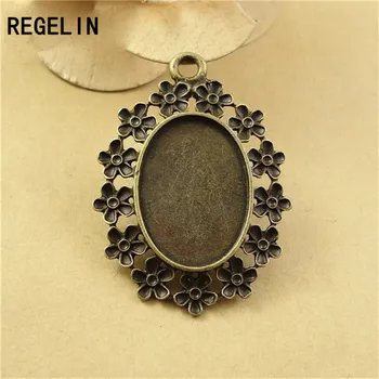 

REGELIN Wholesale vintage bronze oval filigree cameo cabochon 10pcs/lot base 18*25mm Pendant Settings Jewelry Accessories