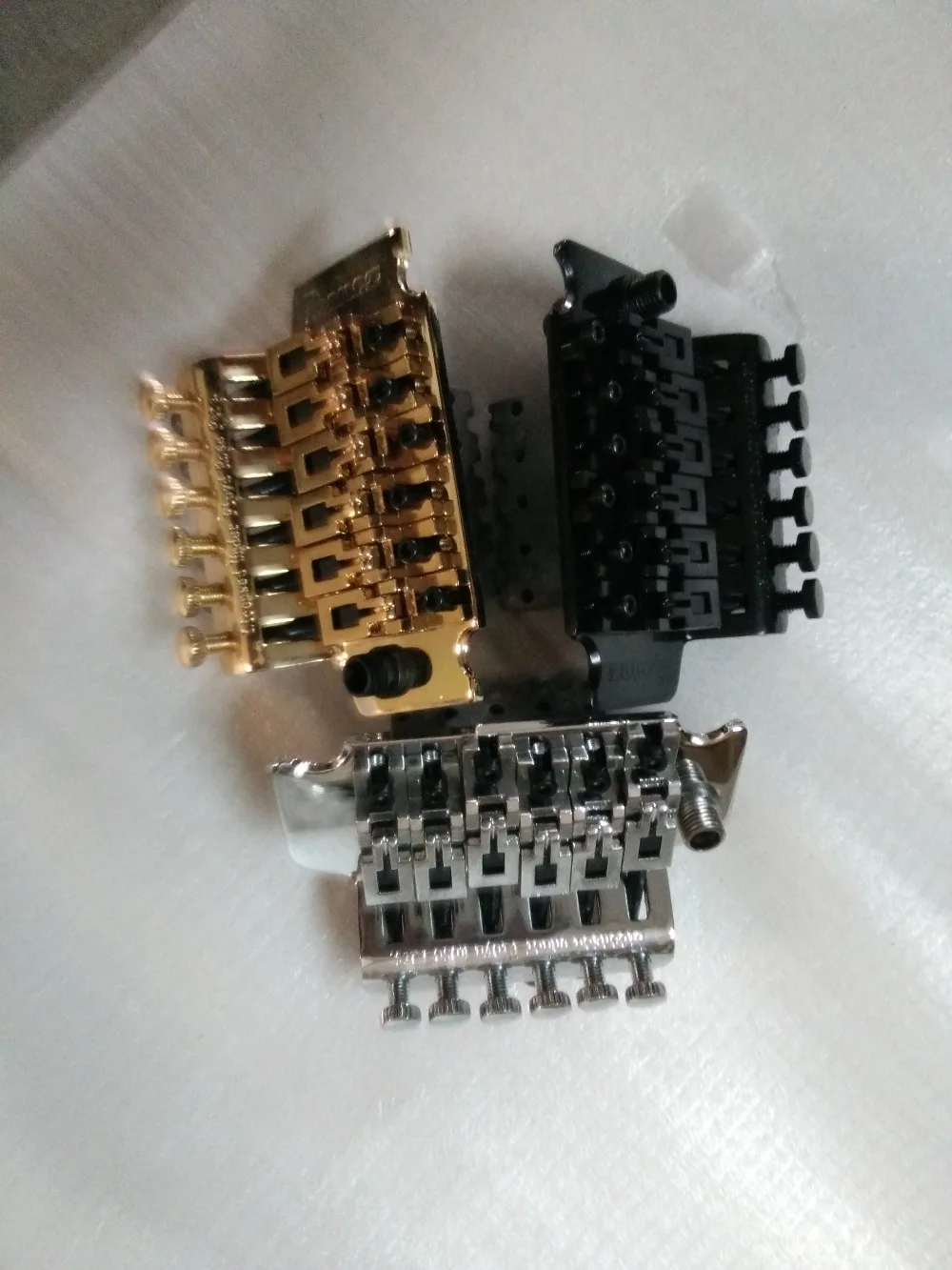 

Electro-acoustic guitar bridge White Black Gold  Double roll electric guitar bridge